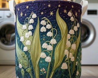 May include: A set of three ceramic mugs with a speckled, matte finish. Each mug features a different color: light blue, cream, and gray. The mugs have a simple, modern design with a rounded shape and a comfortable handle.