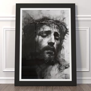 May include: A black and white drawing of a man's face with a crown of thorns. The drawing is done in a realistic style and the man's face is full of pain and suffering.