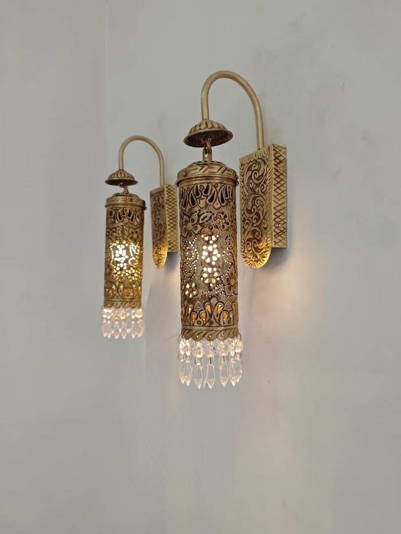 Decorative Moroccan brass wall light with shadow pattern effect