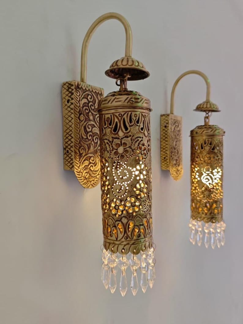 Handmade solid brass Moroccan wall sconce with crystal drops and carved lantern shade