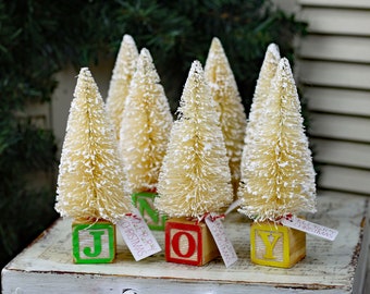 Vintage Style Bottle Brush Tree in a Child's Distressed Wooden Block Creamy White Christmas Tree