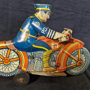 Wind-up Motorcycle Cop by Marx Toys - Etsy