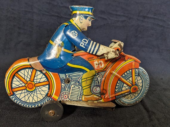 Wind-up Motorcycle Cop by Marx Toys - Etsy