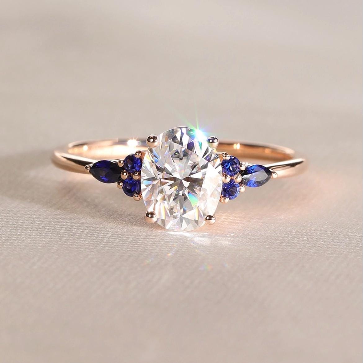 Oval Cut Moissanite Engagement Ring - Rose Gold Ring with Blue Sapphire Accents, Unique Bridal Jewelry, Promise Ring for Women
