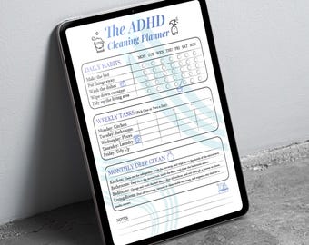 May include: A digital tablet displays "The ADHD Cleaning Planner" with daily and weekly habit checklists. The planner features sections for tasks like making the bed, washing dishes, and deep cleaning, all in a blue and white design.