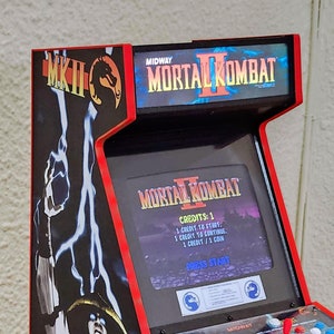 1/4 scale Mortal Kombat II arcade cabinet. Fully functional miniature!