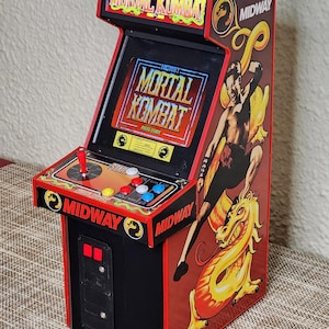 1/6 scale Mortal Kombat arcade cabinet. Fully functional miniature!