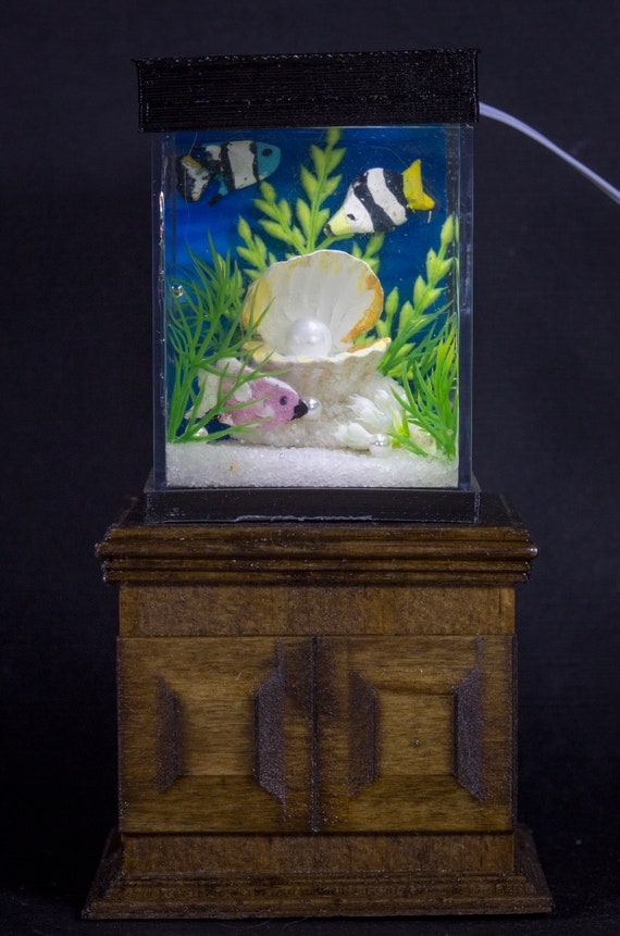 fish tank with dollhouse furniture
