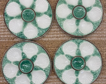 Piatti di ostriche premiati con il premio Longchamps verde e bianco