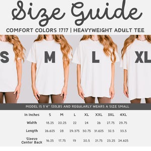 May include: Size guide for Comfort Colors 1717 heavyweight adult tees. The image shows four models wearing white t-shirts, each labeled with a size: S, M, L, and XL. Measurements in inches for width, length, and sleeve center back are provided.