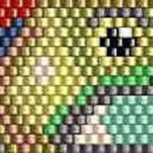 May include: Close-up of a pixelated image of a bird, created with small, colourful beads. The bird features a rainbow of colours, including red, blue, green, and yellow. The beads are arranged in a grid-like pattern.