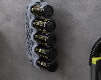 Storage base for Ryobi 4V USB Lithium and Tek4 batteries