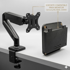Op de afbeelding: Zwarte monitorarm met een klemvoet en scharnieren. Inclusief een VESA-bevestiging en een zwarte rechthoekige beugel met de tekst "Soporte Compatible Para Monitor" en "Samsung M8 Compatible".