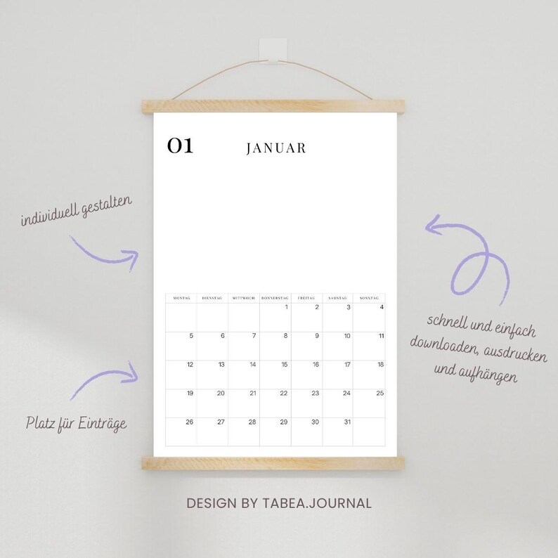 May include: A minimalist white calendar for January, with the number 01 and the word JANUAR at the top. The calendar is held by wooden bars and a string. The design is by TABEA.JOURNAL.