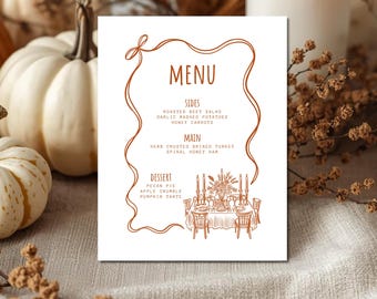 May include: A white menu card with brown text and illustrations. The menu includes sides, main courses, and desserts. The card is decorated with a brown border and a drawing of a table setting. Pumpkins and candles are in the background.