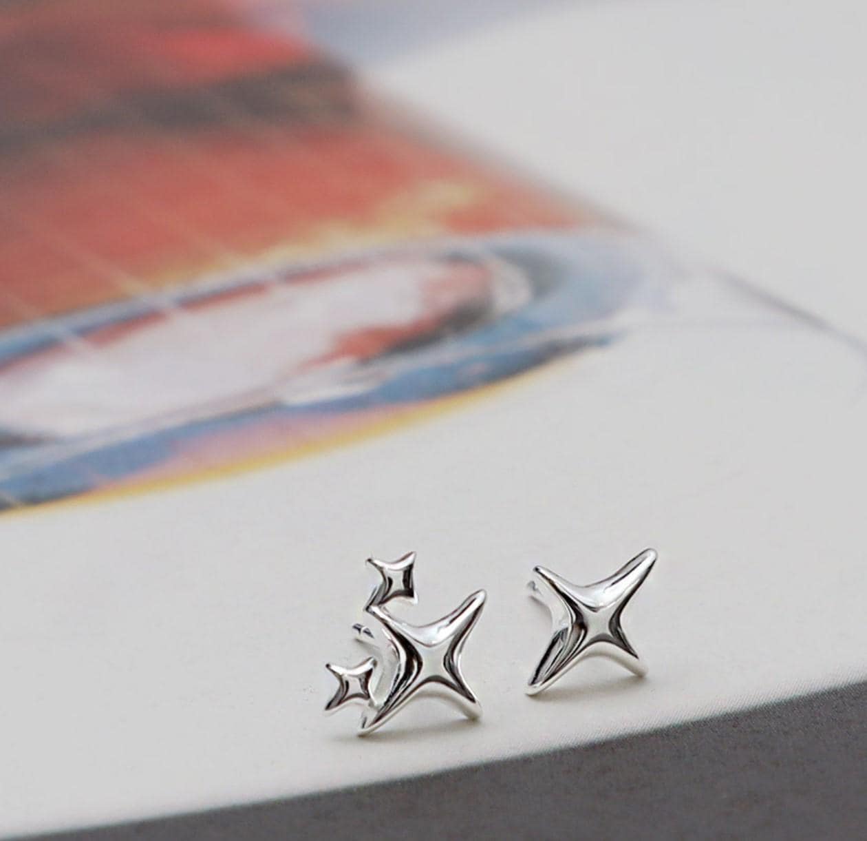 sterling silver sparkling star earrings, dainty minimalist earrings. cute gifts for women.
