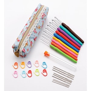 May include: A set of colorful crochet hooks, stitch markers, and knitting needles in a floral print case. The case has a zipper closure and a white lace trim.