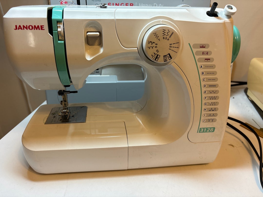 Janome Sewing Machine Model 3128 Compact , Mini, With Extras Barely