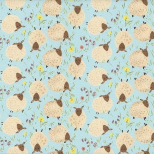 May include: A light blue fabric with a repeating pattern of white sheep with brown faces and legs. The sheep are surrounded by green grass and small yellow, orange, and purple flowers.