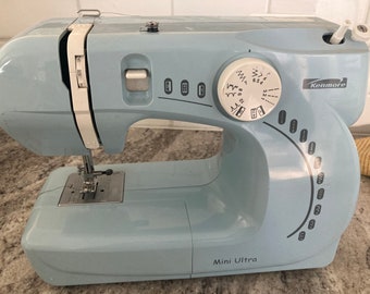 Kenmore Mini Ultra Light Blue Sewing Machine 385.11206300 Pedal, Cord, Cover, Extras, Works Great!