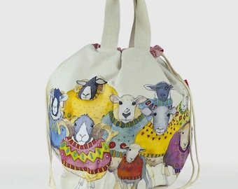 May include: A white canvas drawstring bag with a colorful illustration of sheep wearing sweaters. The sheep are in various poses and have different colored sweaters. The bag has a white cotton handle.
