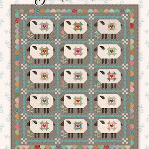 May include: A quilt with a repeating pattern of sheep, each with a heart-shaped design in the center. The quilt features a gray background with blue and colorful borders. The text "Gentle Flock" is at the top.