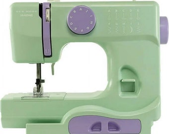 Janome New Home Sewing Machine  Mystical Mint w/ pedal, power cord and Extras! Vinyl Cover Included!