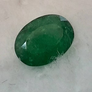 Colombian Emerald 1.48 cts. Natural Gemstone 9 x 7 mm Oval Cut  Deep Forest Green AA Color  has some  Inclusions