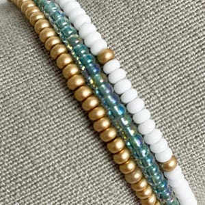 Beaded Bracelet set of 3. Pale green, white and gold combination. Elasticated boho style Unique, pretty, Stretch bracelet. Stackable.