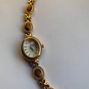 gold tiger eye stones and ribbons watch