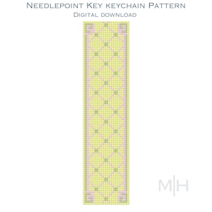 May include: A needlepoint key keychain pattern digital download featuring a rectangular grid design. The pattern displays a yellow background with a repeating diamond lattice in light pink and small green squares at each intersection point.