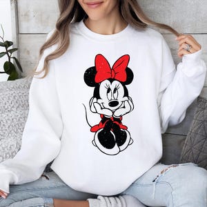 May include: A rustic wooden sign with the text "Welcome to our home" in white lettering. The sign features a distressed finish and a simple, inviting design, perfect for entryway decor.