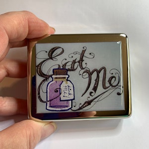 Alice In Wonderland Eat Me 8 Day Pill Box With Mirror