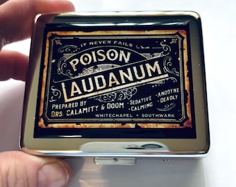 Pastillero vintage con etiqueta de láudano para 7 días con espejo