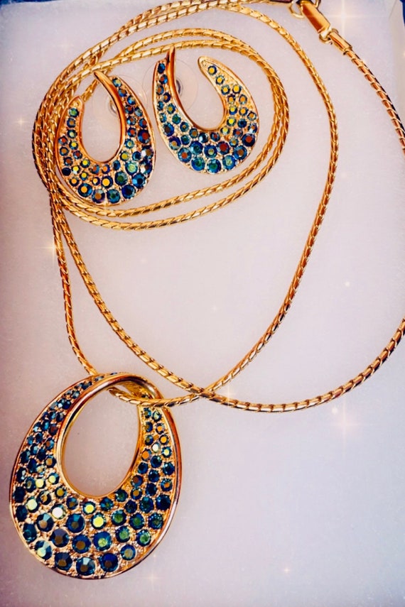 Vintage Swarovski gold tone, blue and blue iridesc