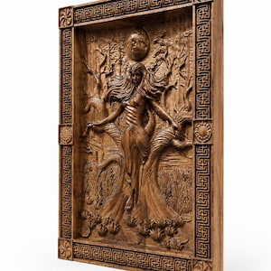 May include: A wooden relief carving depicting a woman with flowing hair in a forest scene. The artwork is framed with a decorative border and features a sun and moon. The carving is made of a light brown wood.