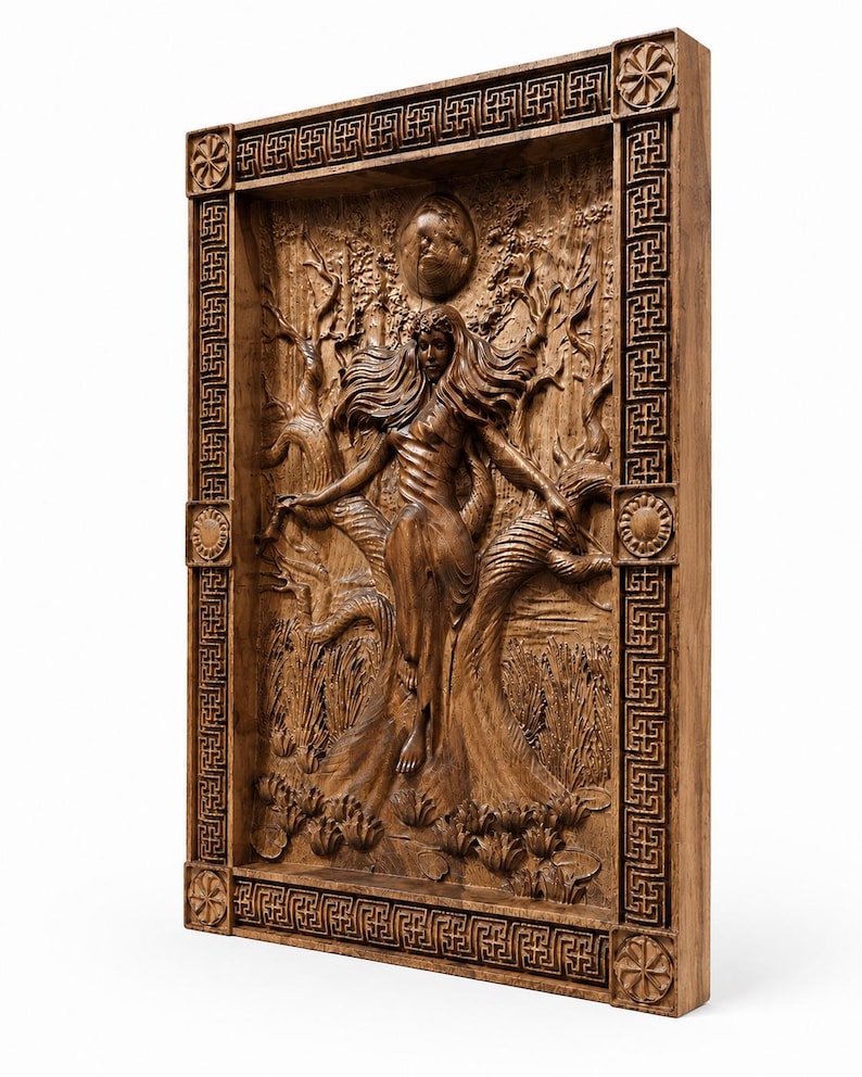 May include: A wooden relief carving depicting a woman with flowing hair in a forest scene. The artwork is framed with a decorative border and features a sun and moon. The carving is made of a light brown wood.