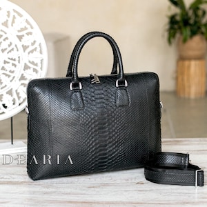 May include: A set of three white ceramic vases of different heights. The vases have a textured, ribbed design. The tallest vase is about 25 cm tall, the medium vase is 20 cm, and the smallest is 15 cm.