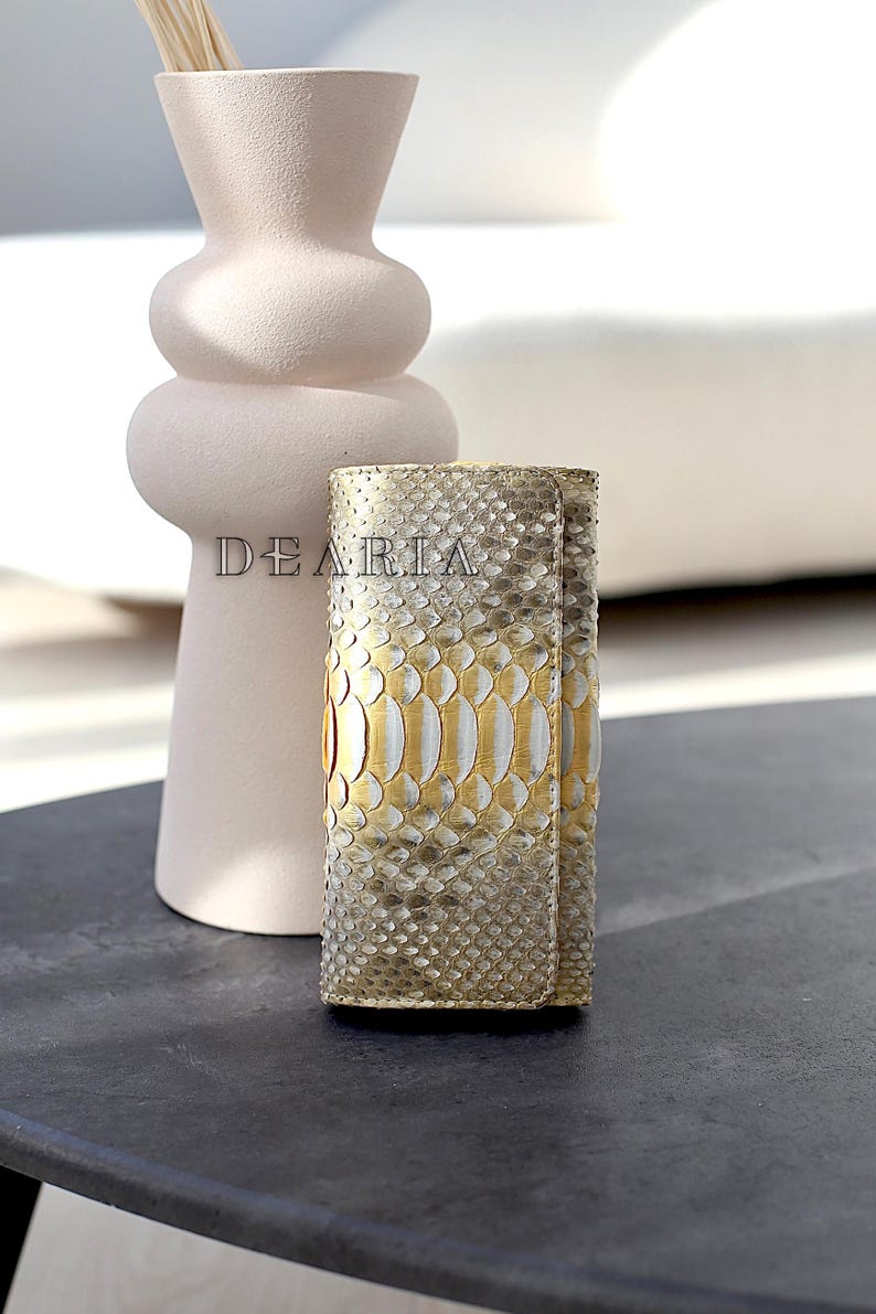 Python skin wallet with metallic gold sheen and natural pattern