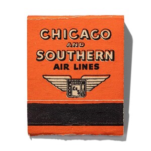 May include: An orange matchbook cover with black text that reads "Chicago and Southern Air Lines" and a black and white logo of a winged shield with the text "Dixie Liner Service".