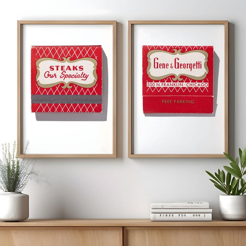 May include: Two framed prints featuring vintage red matchbook covers. The left print displays a white diamond pattern with the text "STEAKS Our Specialty". The right print shows "Gene & Georgetti 500 N. FRANKLIN CHICAGO" and "FREE PARKING".