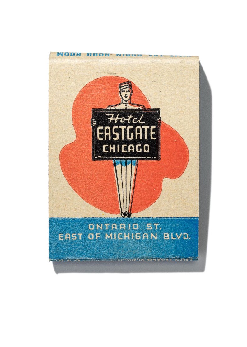 May include: Vintage matchbook cover featuring a red and white illustration of a bellhop holding a sign that reads "Hotel Eastgate Chicago". The text "Ontario St. East of Michigan Blvd." is printed in blue on a white background.