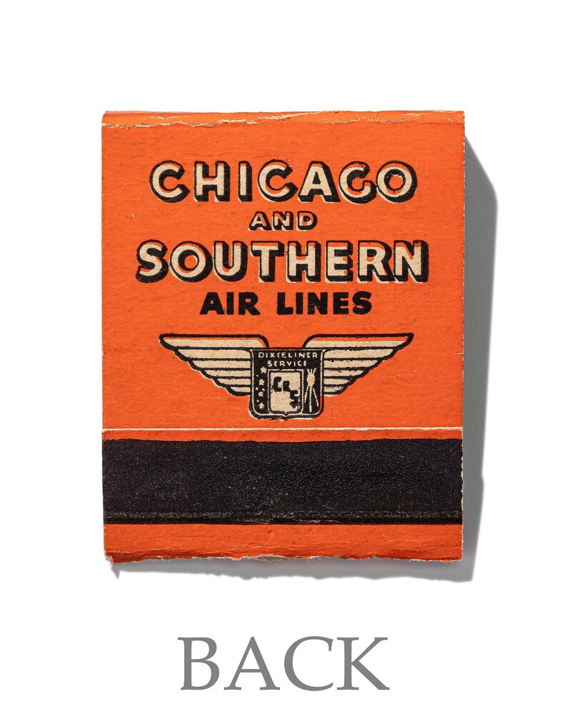 May include: An orange matchbook cover with black text that reads "CHICAGO AND SOUTHERN AIR LINES" and a black and white illustration of a winged airplane with the text "DIXIELAND SERVICE" above it.