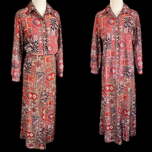 May include: A vintage two-piece set and a long dress. The set includes a collared button-down shirt and a matching skirt. The dress is a long, collared button-down style. Both garments feature a patchwork design in shades of red, black, and gold.