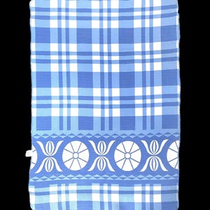 May include: A blue and white plaid patterned towel with a decorative border. The border features a repeating pattern of white circles and stylized floral elements. The towel is rectangular.