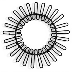 May include: Black metal decorative trivet with a circular design. The trivet features a central ring with radiating, curved bars, creating a sunburst or floral pattern. The design is modern and minimalist, suitable for kitchen or dining decor.