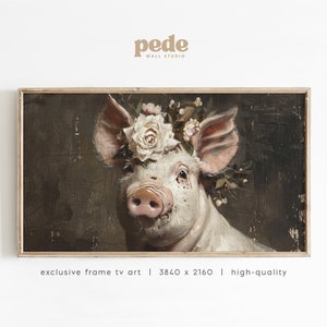 May include: A framed painting of a pig wearing a crown of white and pink flowers. The pig is looking directly at the viewer with a gentle expression. The background is a dark brown colour. The painting is framed in a simple wooden frame.