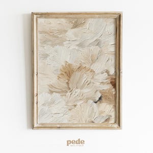 Può includere: Dipinto astratto incorniciato con una tavolozza di colori neutri. L'opera presenta pennellate strutturate nei toni del beige, crema e marrone, creando un senso di profondità e movimento. La cornice è di colore legno chiaro e naturale. È un'opera d'arte decorativa da parete.
