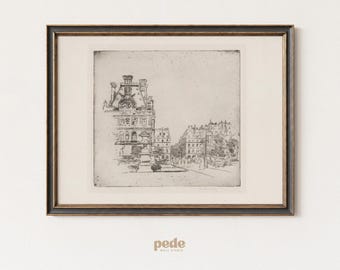 May include: Black and white etching of a European street scene, framed in a dark wood frame with a gold inner border. The artwork depicts buildings and a street with figures, evoking a vintage aesthetic. The bottom of the frame has the text "pede wall studio".