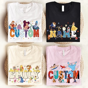 four t-shirts with personalized names and characters printed on them.